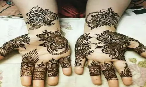Vat Savitri Vrat 2025: दुल्हन जैसा लुक पाने के लिए लगाएं ये आसान और खूबसूरत मेहंदी डिजाइन