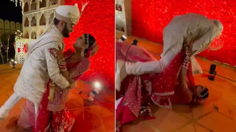 VIDEO: फोटोशूट के दौरान धड़ाम से गिरे दूल्हा-दुल्हन, फिर... VIDEO: फोटोशूट के दौरान धड़ाम से गिरे दूल्हा-दुल्हन, फिर...