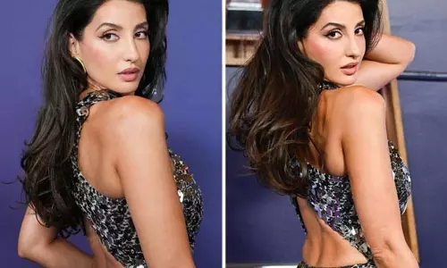 नोरा फतेही ने AMAs के रेड कार्पेट पर तेंदुए प्रिंट वाले कस्टम टॉम फोर्ड गाउन में ग्लैमर का तड़का लगाया