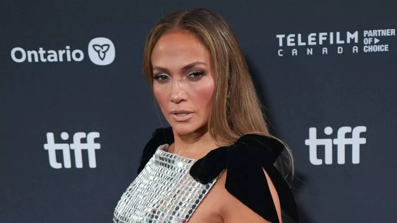 क्या Jennifer Lopez का डांसर्स के साथ AMAs किस योजनाबद्ध था? क्या Jennifer Lopez का डांसर्स के साथ AMAs किस योजनाबद्ध था?
