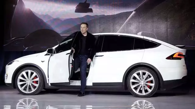कुमारस्वामी बोले, Tesla को भारत में EV प्लांट में कोई रुचि नहीं कुमारस्वामी बोले, Tesla को भारत में EV प्लांट में कोई रुचि नहीं