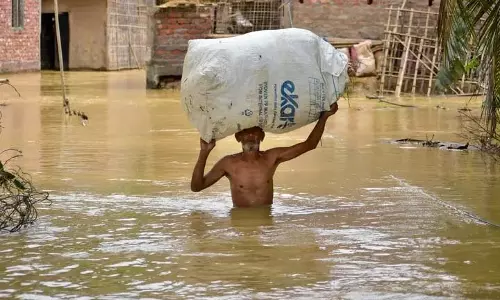 Assam में बाढ़ की स्थिति में सुधार, लेकिन मृतकों की संख्या 26 हुई