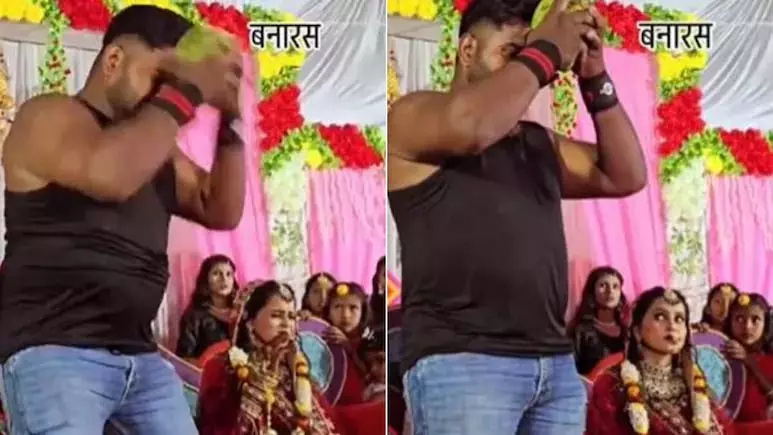 पहलवान ने दूल्हा-दुल्हन के सामने इस अंदाज में फोड़ा नारियल, जमकर वायरल हुआ VIDEO पहलवान ने दूल्हा-दुल्हन के सामने इस अंदाज में फोड़ा नारियल, जमकर वायरल हुआ VIDEO