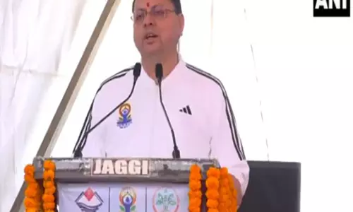 Uttarakhand CM ने आठ देशों के प्रतिनिधियों के साथ योग संगम कार्यक्रम में हिस्सा लिया