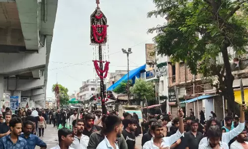 Badaun: शिया समाज ने निकाला ताज़िया और अलम का जुलूस