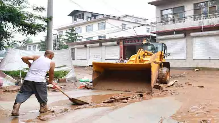 उत्तरी चीन में बारिश से 2 लोगों की मौत, हजारों लोगों को घर बदलने पर मजबूर होना पड़ा उत्तरी चीन में बारिश से 2 लोगों की मौत, हजारों लोगों को घर बदलने पर मजबूर होना पड़ा