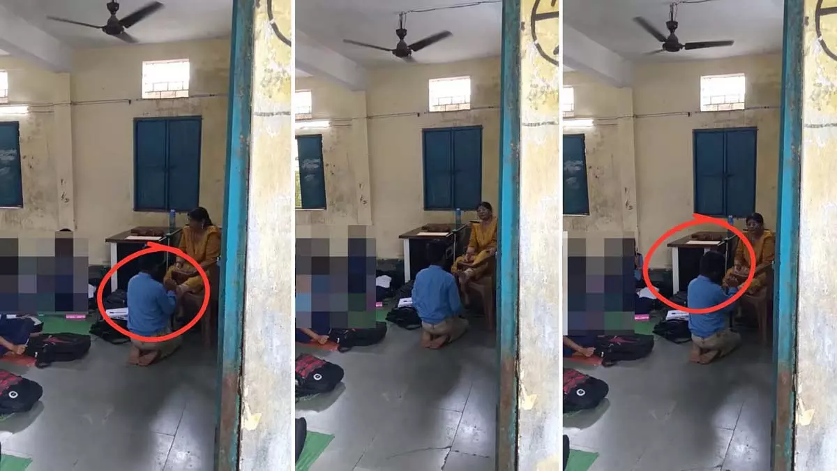 Bhopal : सरकारी स्कूल की शिक्षिका छात्र से पैर की मालिश करवाती दिखी Bhopal : सरकारी स्कूल की शिक्षिका छात्र से पैर की मालिश करवाती दिखी