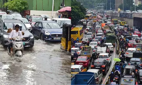 Hyderabad में बारिश, सड़कों पर गड्ढे, दैनिक आवागमन बाधित Hyderabad में बारिश, सड़कों पर गड्ढे, दैनिक आवागमन बाधित