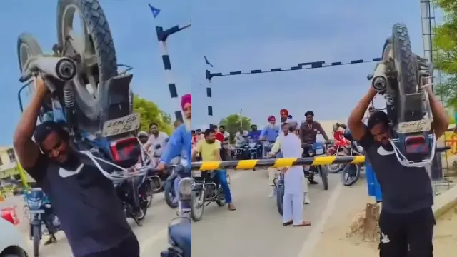 बाहुबली की तरह 112 किलो की Bike उठाकर रेलवे फाटक पार, देखें VIDEO बाहुबली की तरह 112 किलो की Bike उठाकर रेलवे फाटक पार, देखें VIDEO