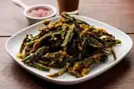 Kurkuri Bhindi Recipe: सिर्फ 10 मिनट में बोरिंग भिंडी को बनाएं मजेदार और कुरकुरी Kurkuri Bhindi Recipe: सिर्फ 10 मिनट में बोरिंग भिंडी को बनाएं मजेदार और कुरकुरी