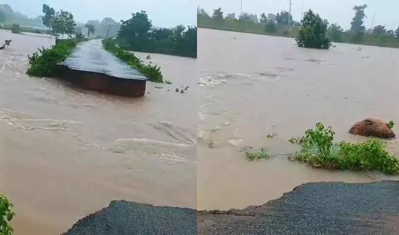 मेडक, Sangareddy में भारी बारिश से सड़कें कट गईं मेडक, Sangareddy में भारी बारिश से सड़कें कट गईं