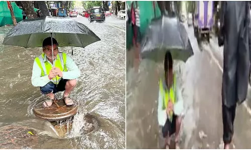 Mumbai: बीएमसी के बहादुर कर्मचारी ने खुले मैनहोल से नागरिकों की रक्षा की Mumbai: बीएमसी के बहादुर कर्मचारी ने खुले मैनहोल से नागरिकों की रक्षा की