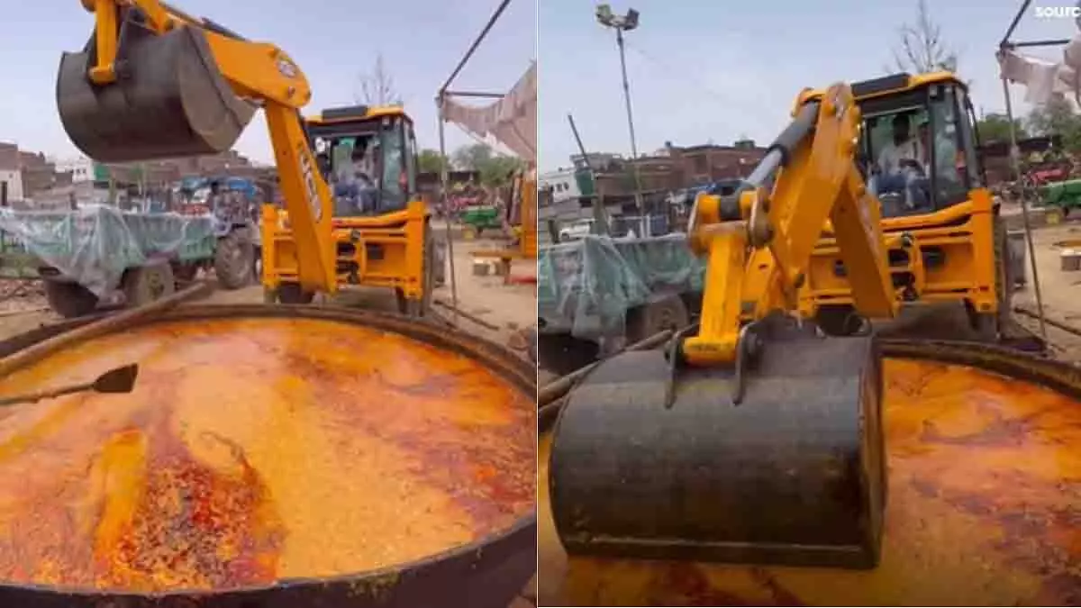 विशालकाय बर्तन में दाल मखनी बनाने के लिए JCB का इस्तेमाल विशालकाय बर्तन में दाल मखनी बनाने के लिए JCB का इस्तेमाल