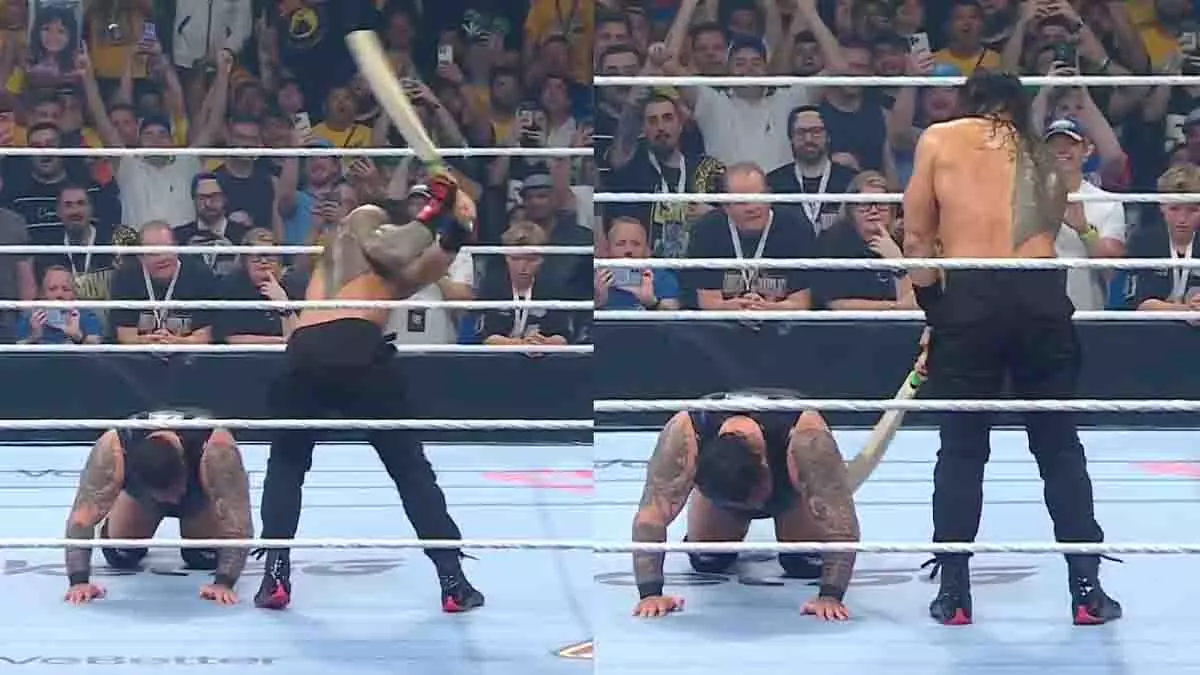 WWE क्राउन ज्वेल: रोमन रेंस ने ब्रॉनसन रीड को क्रिकेट बैट से रौंदा WWE क्राउन ज्वेल: रोमन रेंस ने ब्रॉनसन रीड को क्रिकेट बैट से रौंदा