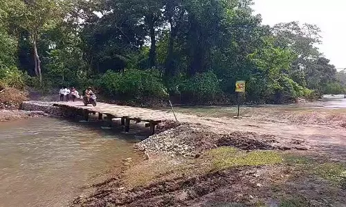Halong में जलस्तर घटा, अस्थायी पुल फिर से चालू