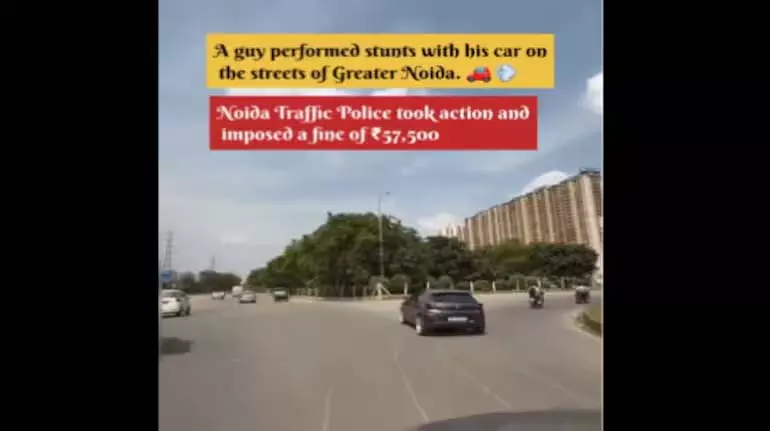 Noida में एक व्यक्ति ने व्यस्त सड़क के बीचों-बीच खतरनाक कार स्टंट किया Noida में एक व्यक्ति ने व्यस्त सड़क के बीचों-बीच खतरनाक कार स्टंट किया