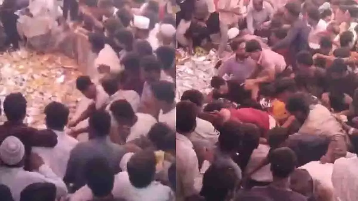 AIMIM उम्मीदवार के नामांकन समारोह में बिरयानी लूट की घटना वायरल AIMIM उम्मीदवार के नामांकन समारोह में बिरयानी लूट की घटना वायरल