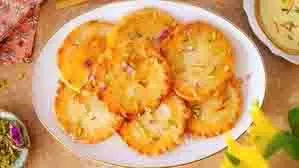 Recipe: घर पर बनाये स्वादिष्ट मीठे मालपुआ Recipe: घर पर बनाये स्वादिष्ट मीठे मालपुआ