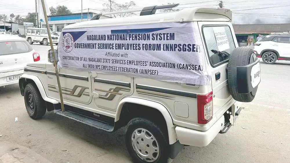 Nagaland ओपीएस की मांग: सरकारी कर्मचारियों ने कार स्टिकर रैली निकाली Nagaland ओपीएस की मांग: सरकारी कर्मचारियों ने कार स्टिकर रैली निकाली