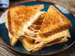 Schezwan Chilli Cheese Sandwich : घर पर बनाएं चीजी और क्रिस्पी कैफे स्टाइल सैंडविच Schezwan Chilli Cheese Sandwich : घर पर बनाएं चीजी और क्रिस्पी कैफे स्टाइल सैंडविच