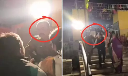 MP : ओरछा में राम विवाह महोत्सव के दौरान पुलिस वाले ने पटवारी को थप्पड़ मारा MP : ओरछा में राम विवाह महोत्सव के दौरान पुलिस वाले ने पटवारी को थप्पड़ मारा