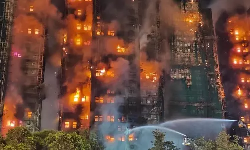 Hong Kong में रिहायशी इमारत में आग लगने से मरने वालों की संख्या बढ़कर 94 हुई
