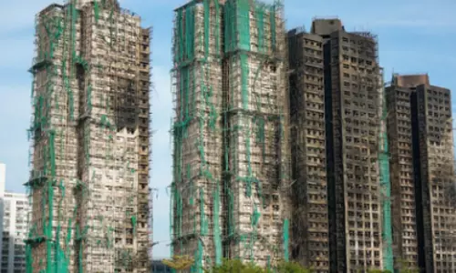 Hong Kong पुलिस रिहायशी इलाके में लगी आग की पूरी जांच करेगी