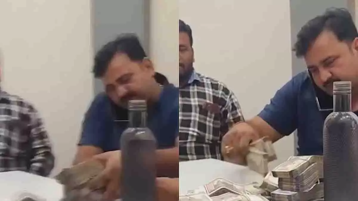 वायरल वीडियो से गुस्सा, बिल्डर ने सीनियर पुलिस inspector के सामने कैश गिना वायरल वीडियो से गुस्सा, बिल्डर ने सीनियर पुलिस inspector के सामने कैश गिना