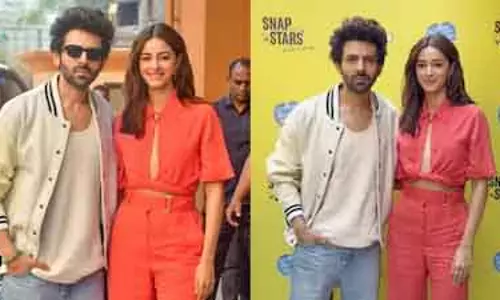 Ananya Panday ने कार्तिक आर्यन संग इवेंट में ब्राइट ऑरेंज आउटफिट में किया जलवा