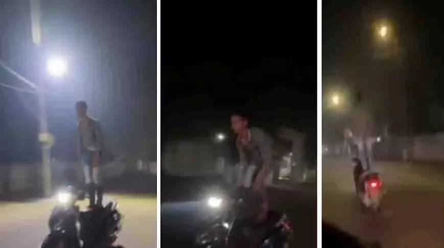 Gwalior में व्यस्त सड़क पर युवक ने खतरनाक स्कूटर स्टंट किया Gwalior में व्यस्त सड़क पर युवक ने खतरनाक स्कूटर स्टंट किया