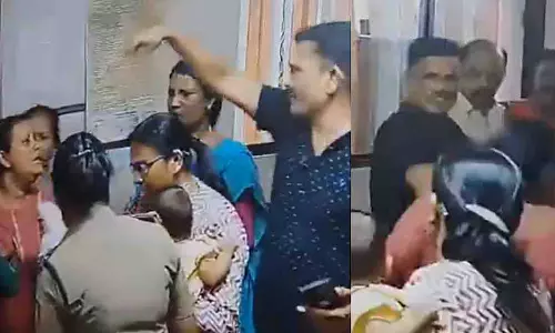 केरल पुलिस विवाद: 3 महीने के बच्चे को गोद में लिए महिला को SHO ने मारा थप्पड़ केरल पुलिस विवाद: 3 महीने के बच्चे को गोद में लिए महिला को SHO ने मारा थप्पड़