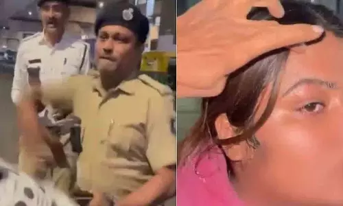 Ahmedabad में पुलिस की बर्बरता: पुलिसकर्मी ने कैमरे के सामने महिला बाइक सवार को थप्पड़ मारा