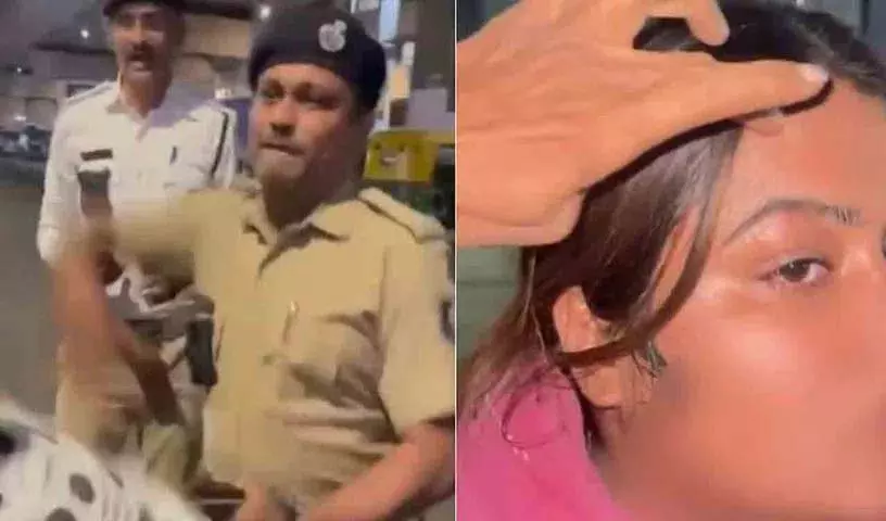 Ahmedabad में पुलिस की बर्बरता: पुलिसकर्मी ने कैमरे के सामने महिला बाइक सवार को थप्पड़ मारा Ahmedabad में पुलिस की बर्बरता: पुलिसकर्मी ने कैमरे के सामने महिला बाइक सवार को थप्पड़ मारा