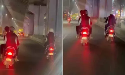 Scooty पर सवार लोगों ने महिला को परेशान किया, वीडियो वायरल