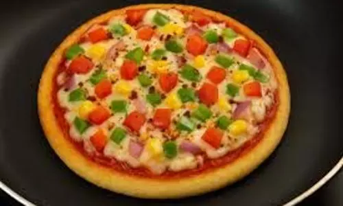 Pizza:नए साल पर बनाएं बाजरे का देसी पिज्जा Pizza:नए साल पर बनाएं बाजरे का देसी पिज्जा