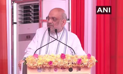 अहमदाबाद में अमित शाह ने 205 परिवारों को भूमि आवंटन प्रमाण पत्र वितरित किए