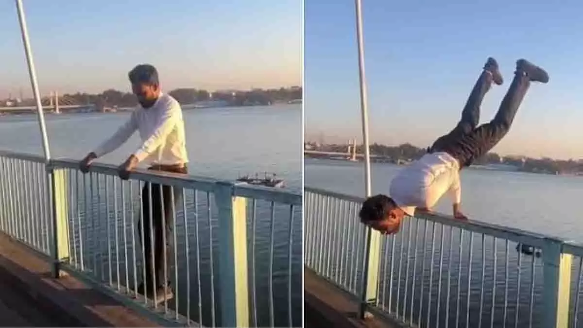 Bhopal की वीआईपी रोड पर अपर लेक के ऊपर युवक ने मयूरासन किया Bhopal की वीआईपी रोड पर अपर लेक के ऊपर युवक ने मयूरासन किया