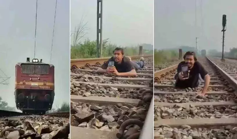 Reels के क्रेज में ट्रेन के नीचे लेट गया युवक Reels के क्रेज में ट्रेन के नीचे लेट गया युवक