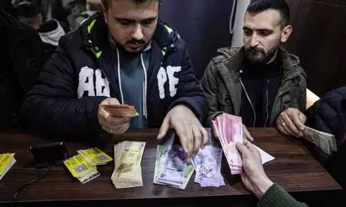 Syria की नई करेंसी: पुराने नोटों से हटेंगे दो जीरो