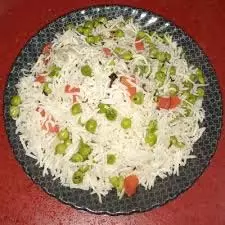 Gajar Matar Pulao: सर्दियों में डिनर में बनाएं फ्लेवरफुल गाजर मटर पुलाव Gajar Matar Pulao: सर्दियों में डिनर में बनाएं फ्लेवरफुल गाजर मटर पुलाव