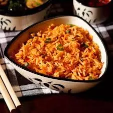 Schezwan Fried Rice Recipe: कुकर में झटपट बनाएं शेज़वान फ्राइड राइस Schezwan Fried Rice Recipe: कुकर में झटपट बनाएं शेज़वान फ्राइड राइस