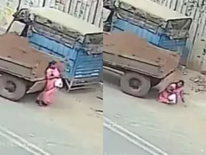 Surat में महिला ट्रैक्टर के नीचे, फोन ध्यान भटकाने का कारण Surat में महिला ट्रैक्टर के नीचे, फोन ध्यान भटकाने का कारण