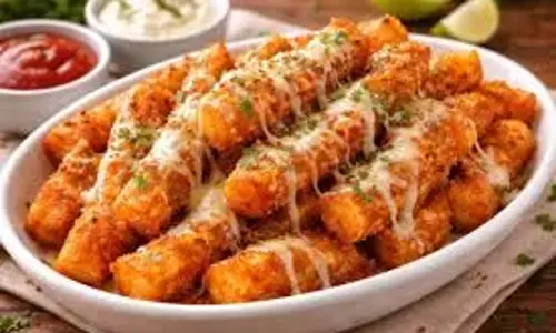 Cheesy Idli Fries Recipe: बची हुई इडली से बनाएं परफेक्ट क्रिस्पी स्नैक Cheesy Idli Fries Recipe: बची हुई इडली से बनाएं परफेक्ट क्रिस्पी स्नैक