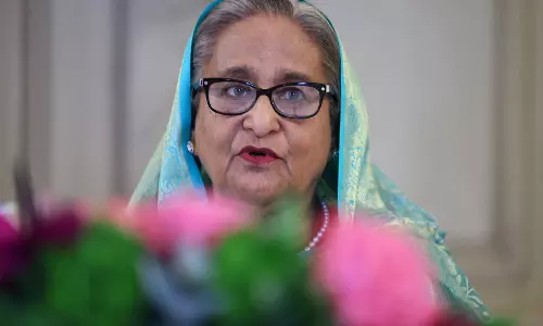 शेख हसीना ने Bangladesh चुनावों को सुनियोजित तमाशा बताया, पार्टी बहाल करने की मांग की शेख हसीना ने Bangladesh चुनावों को सुनियोजित तमाशा बताया, पार्टी बहाल करने की मांग की