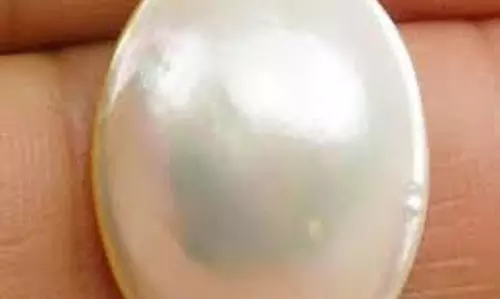 Gem Astrology: मोती धारण करने वाले गलती से भी ना करें ये काम, वरना चंद्रमा के अशुभ प्रभाव से होगा भारी नुकसान Gem Astrology: मोती धारण करने वाले गलती से भी ना करें ये काम, वरना चंद्रमा के अशुभ प्रभाव से होगा भारी नुकसान