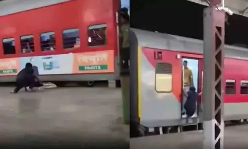 दो बार गिरने के बावजूद महिला ने चलती train में चढ़ने की कोशिश की दो बार गिरने के बावजूद महिला ने चलती train में चढ़ने की कोशिश की