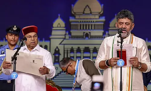 Karnataka : शिवकुमार की शपथ के बाद समर्थक की दावत में विवाद