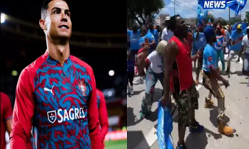 Cristiano Ronaldo के ‘Siu’ सेलिब्रेशन की नकल कर DR कांगो के फैंस ने उड़ाया मज़ाक, वीडियो वायरल Cristiano Ronaldo के ‘Siu’ सेलिब्रेशन की नकल कर DR कांगो के फैंस ने उड़ाया मज़ाक, वीडियो वायरल
