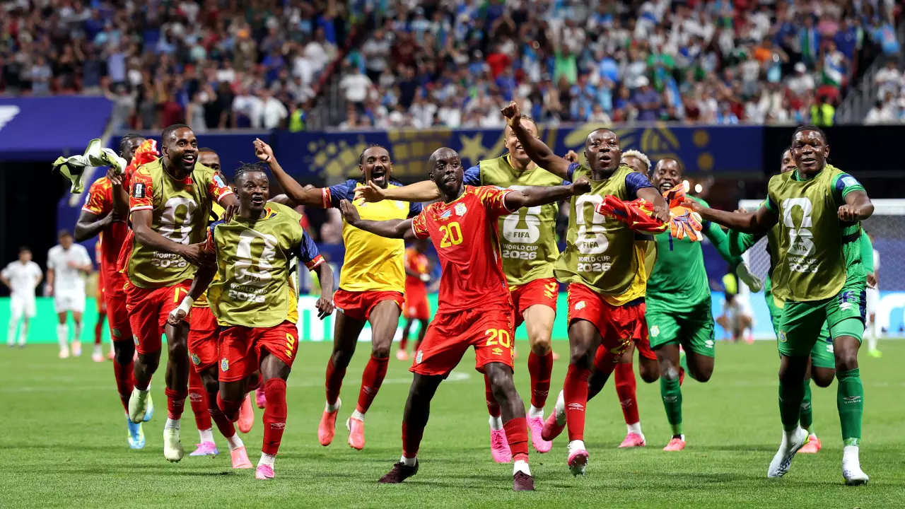 FIFA WC: DR कांगो ने 52 साल में पहली बार वर्ल्ड कप जीतकर नॉकआउट में जगह बनाई FIFA WC: DR कांगो ने 52 साल में पहली बार वर्ल्ड कप जीतकर नॉकआउट में जगह बनाई