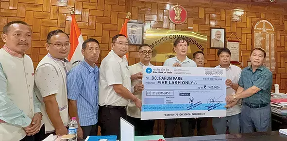 Arunachal: पी/पारे बाढ़ प्रभावितों की मदद के लिए एनईएस ने किया 5 लाख रुपये का योगदान